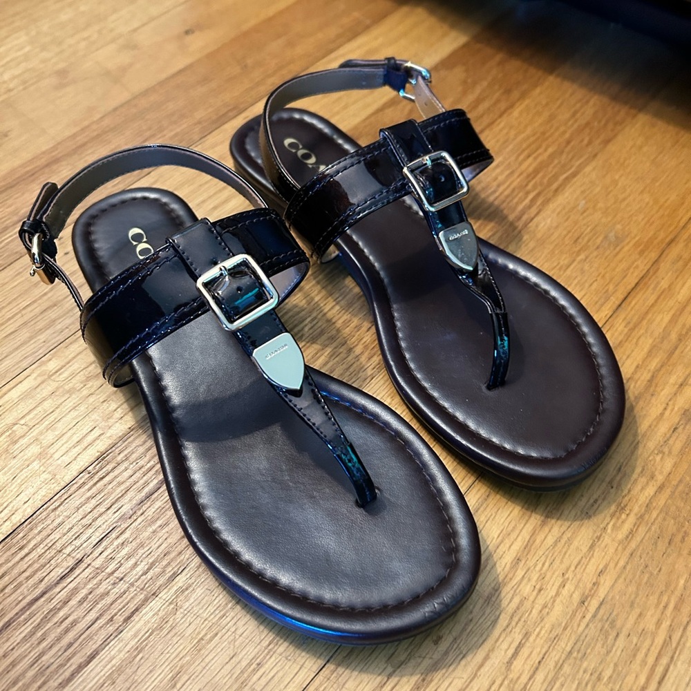 The Coach Women's Size 6B black raspberry Leather Thong Slingback Flat Sandal